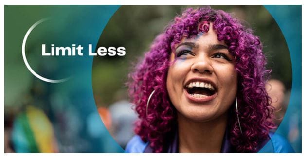 Limit Less logo with girl with purple hair, laughing and happy.